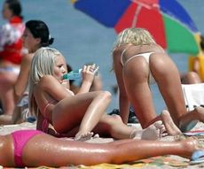 Nude beautiful girls on the beach. They having